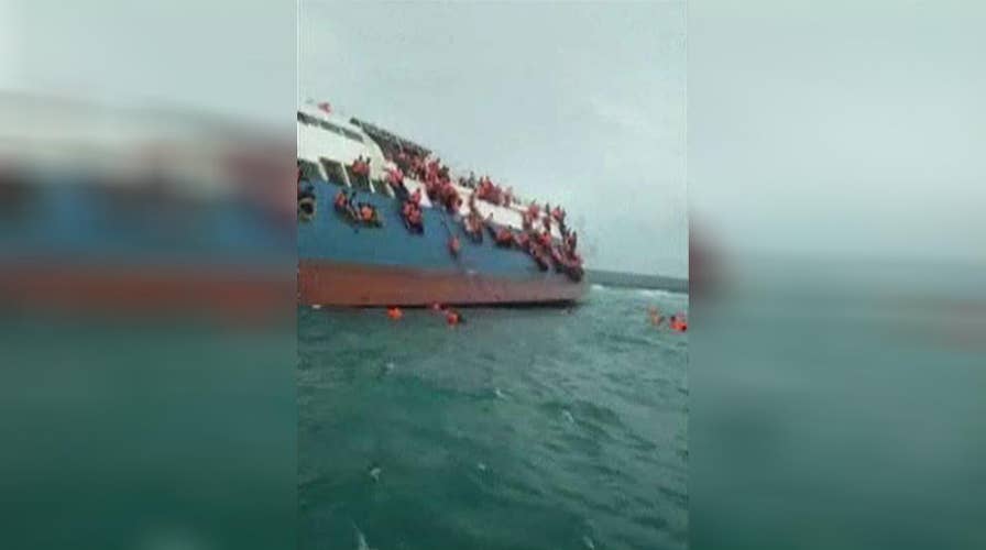 Crews rescue passengers from sinking ferry off Indonesia
