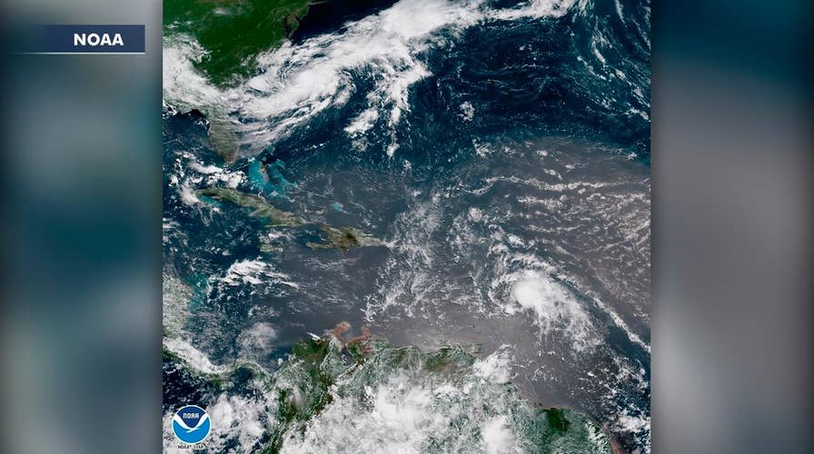 Beryl downgraded as Tropical Storm Chris gains strength