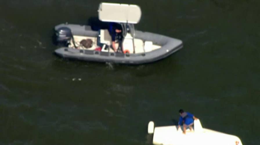 NYPD rescues man from overturned boat