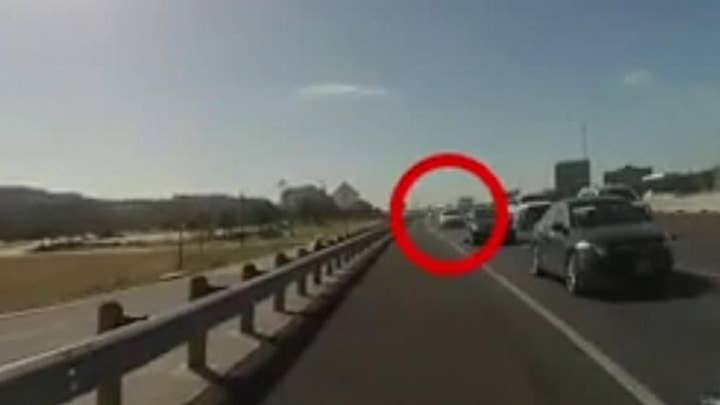 Officer almost hit while at traffic stop