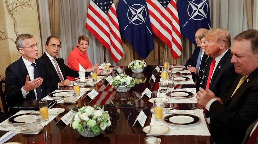 Trump kicks off NATO summit with testy breakfast meeting