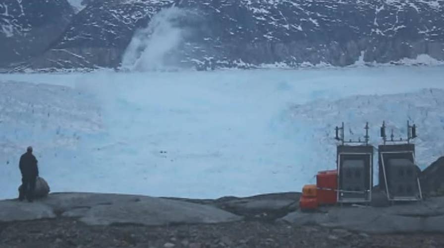 Four-mile iceberg breaks away from a glacier in Greenland