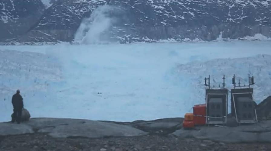 Four-mile iceberg breaks away from a glacier in Greenland