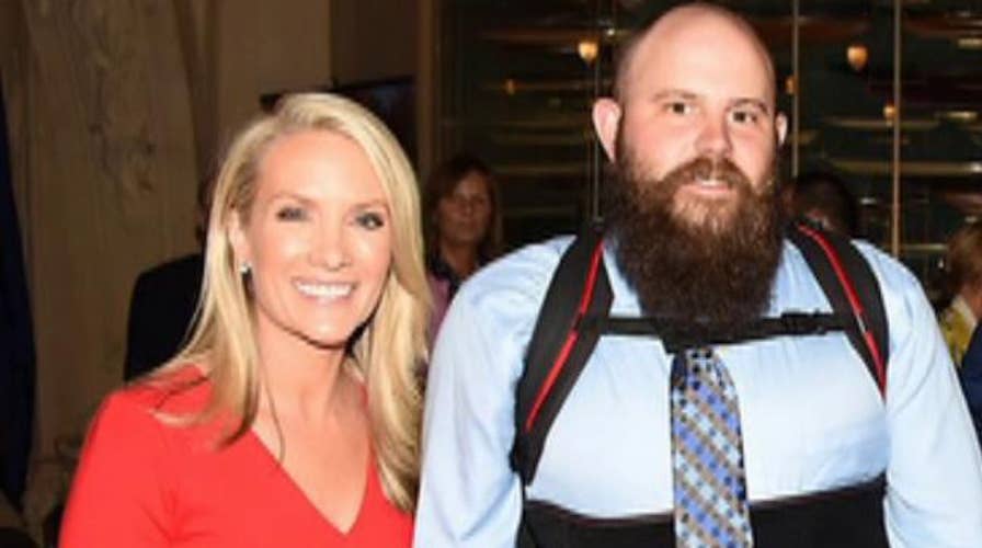 Wounded warrior receives robotic exoskeleton suit