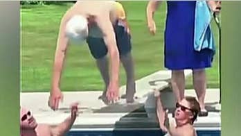 Veteran, 95, jumps off diving board to motivate scared boy