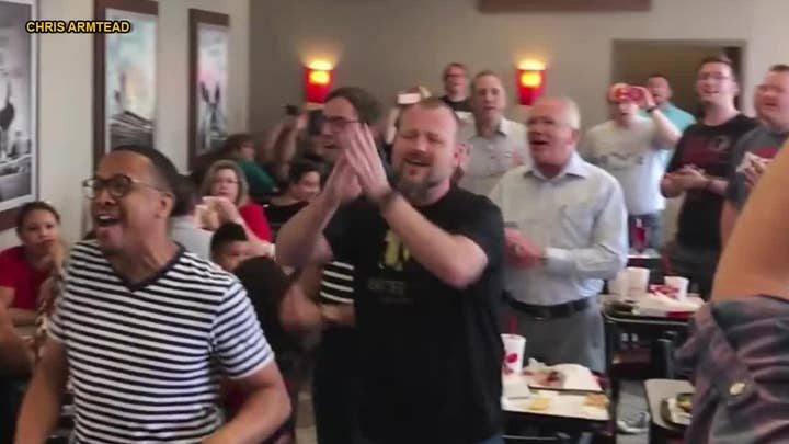 Flash mob surprises Chick-fil-A with a cappella gospel song