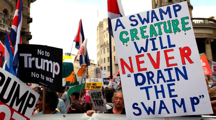 Anti-Trump, anti-capitalist protesters pack London streets