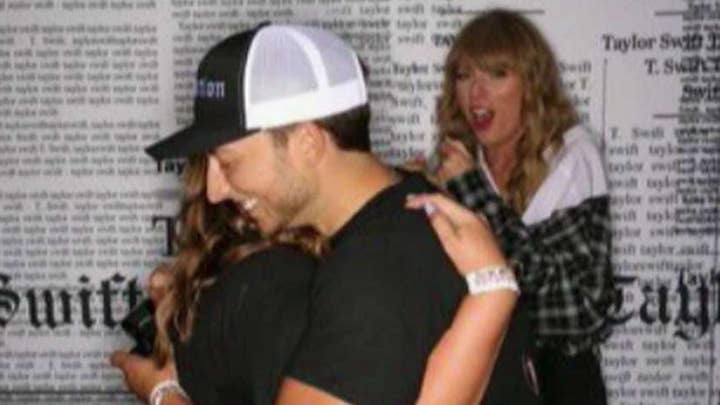 Couple gets engaged in front of Taylor Swift
