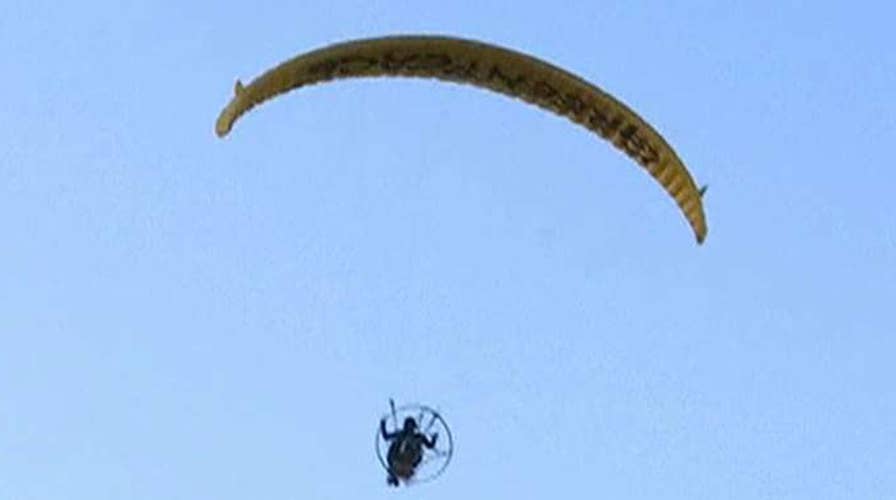 Anti-Trump paraglider arrested by Scottish police