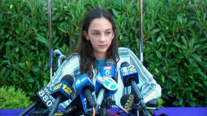 Girl describes Long Island shark attack at press conference
