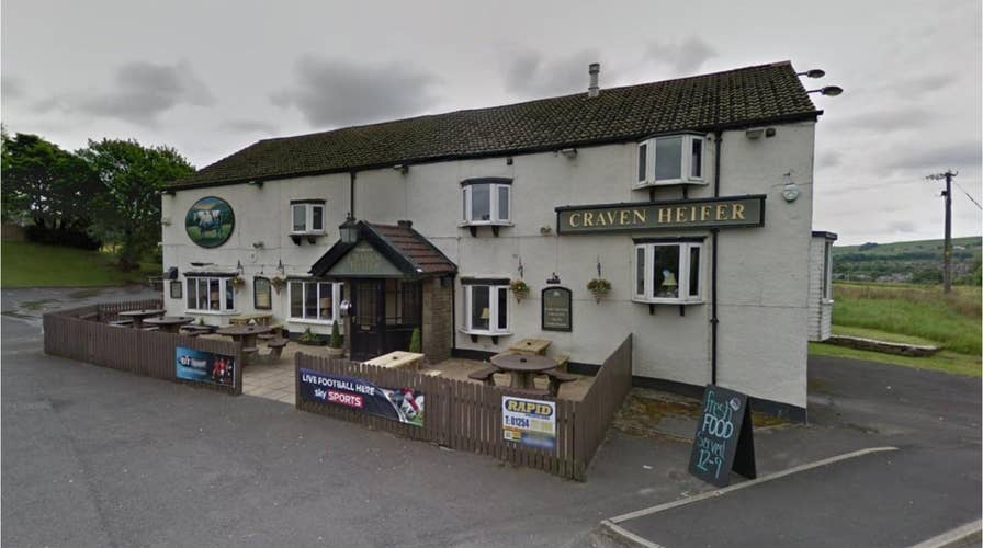 Bitter patron drives car through beer garden