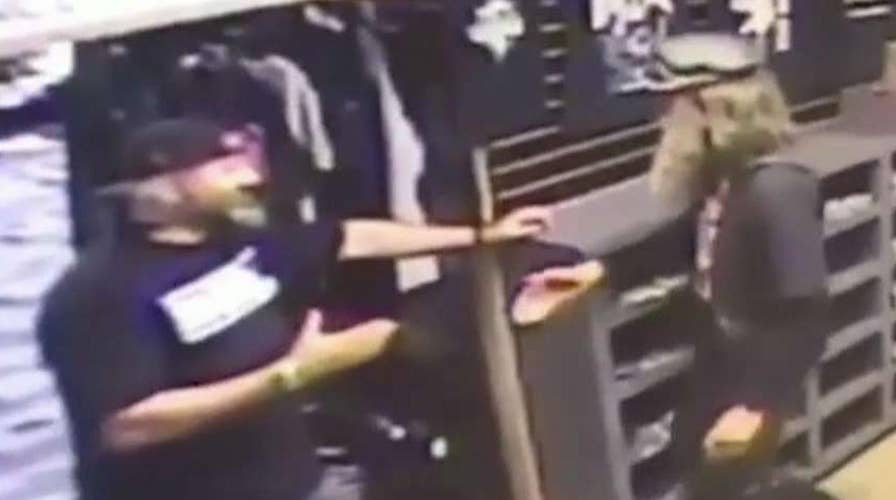 Disguised Sacha Baron Cohen confronted by gun store owner