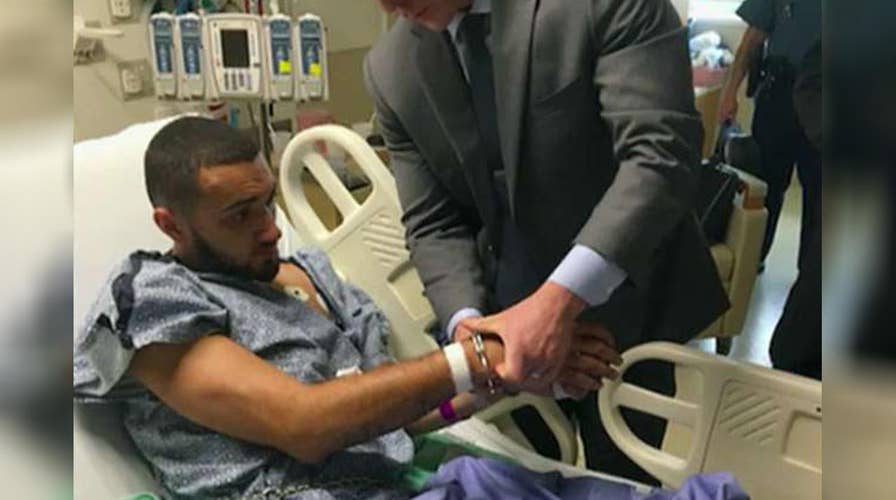 Slain Massachusetts cop's handcuffs used on suspect