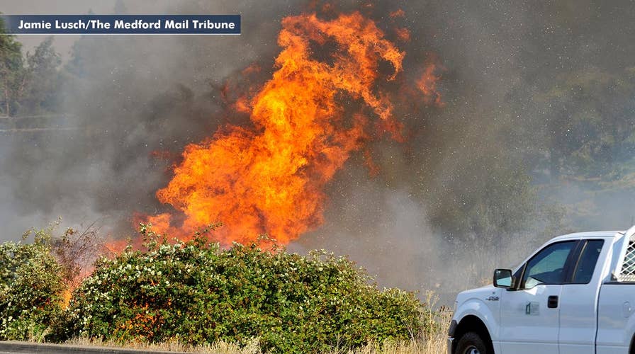 Extreme heat adds fuel to deadly Western wildfires