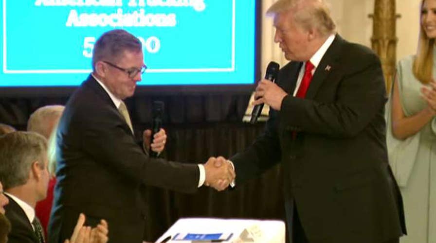 Trump signs 'pledge to America's workers'