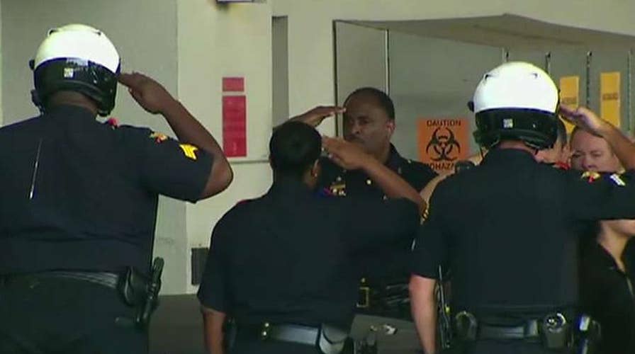 Dallas officer hit, killed by SUV during funeral escort