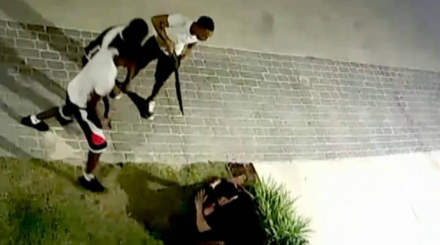 Dallas couple robbed at gunpoint outside their home