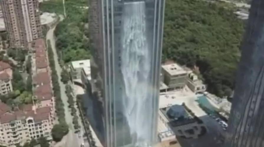 Chinese skyscraper features 350-foot waterfall