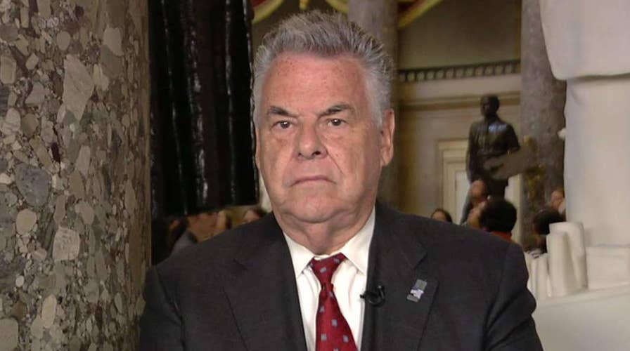 King: Serves no purpose to give Brennan a security clearance