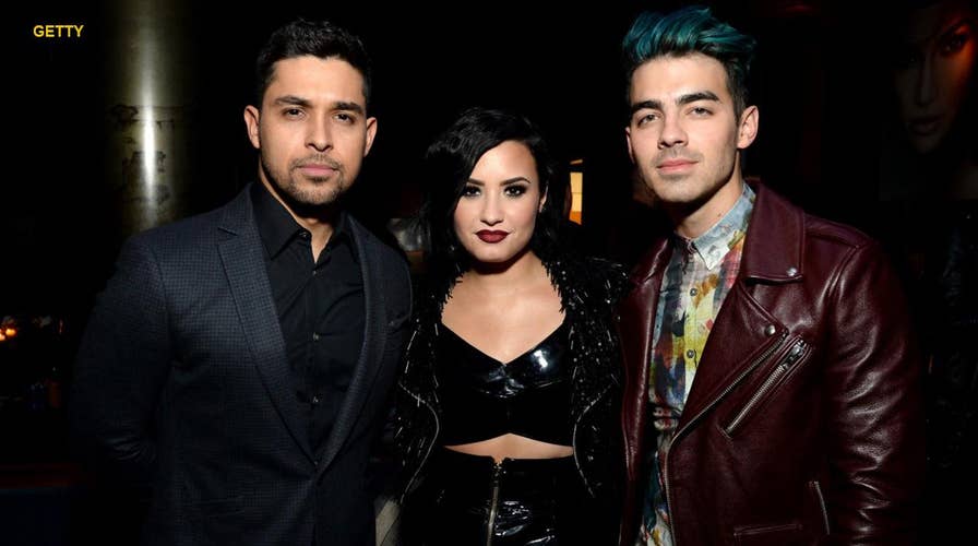 Demi Lovato 'awake' after apparent overdose: Exes react