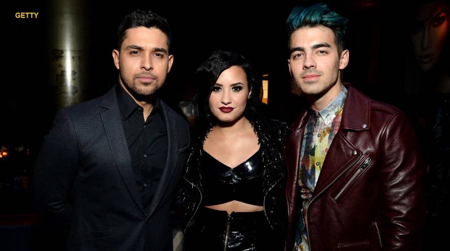 Demi Lovato 'awake' after apparent overdose: Exes react