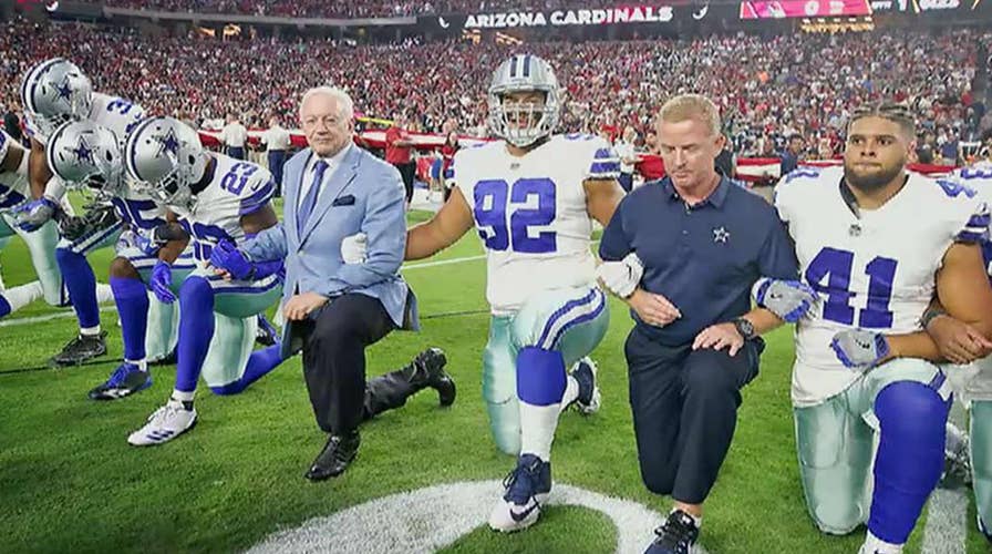 Cowboys required to stand during anthem