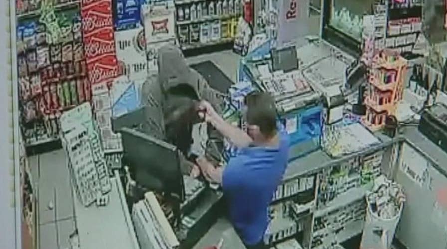 Gas station clerk uses martial arts to fight back robber