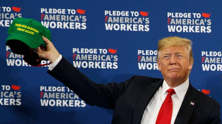 Trump reassures Iowa farmers on trade