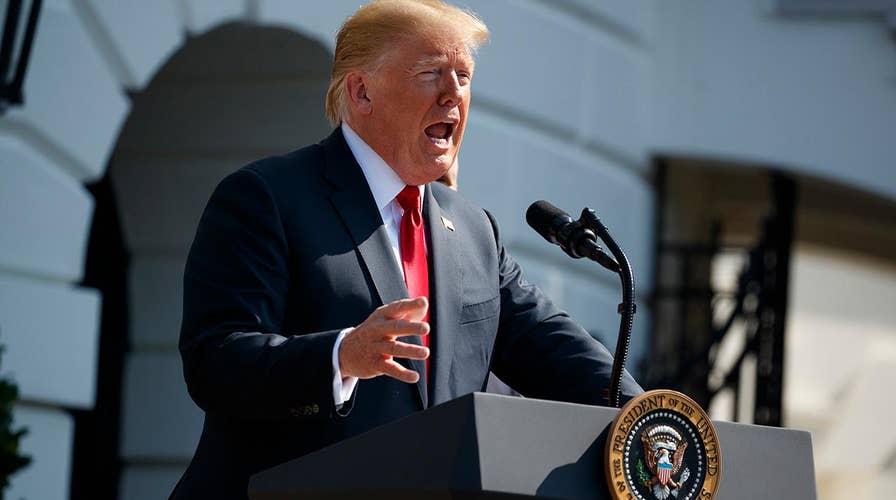 Trump touts economy, slams new Cohen claims