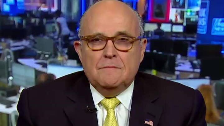 Rudy Giuliani takes aim at Michael Cohen's credibility