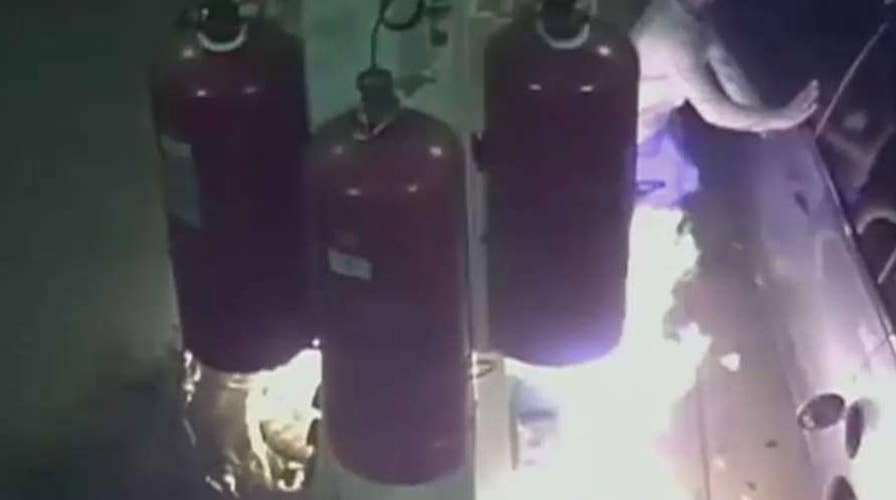 Man sets New York gas station on fire