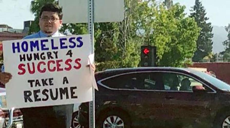 Homeless college graduate hands out resumes in California