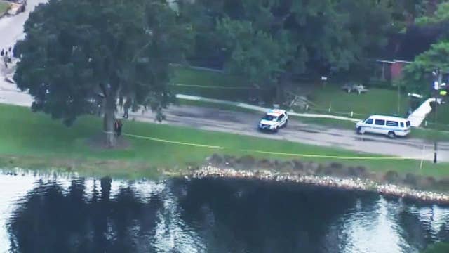 Raw video: Divers search for girl reportedly thrown in river