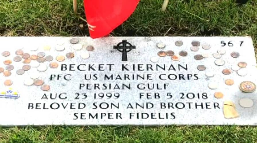 Military mom claims someone stole coins from son's grave