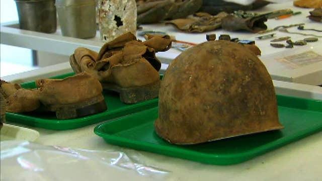 Military artifacts found among remains returned by NKorea