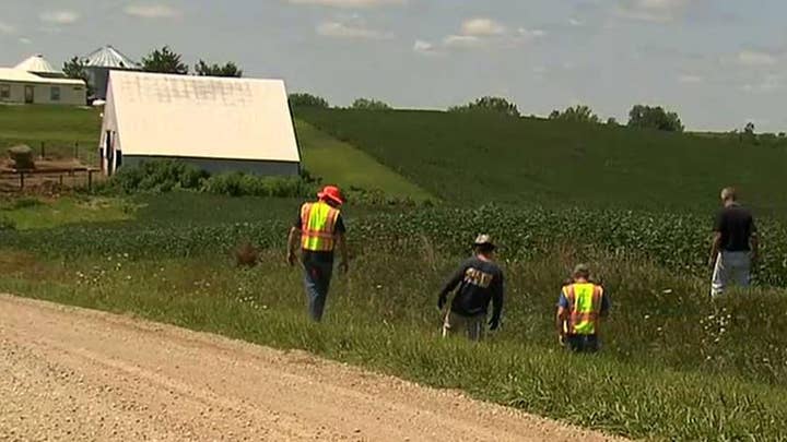 Authorities searching for Mollie Tibbetts return to pig farm