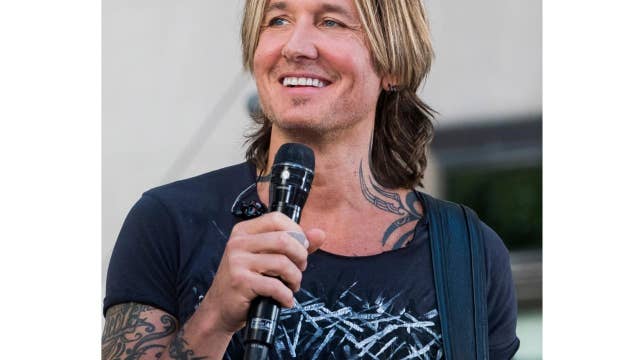 New Jersey woman buys coffee for Keith Urban