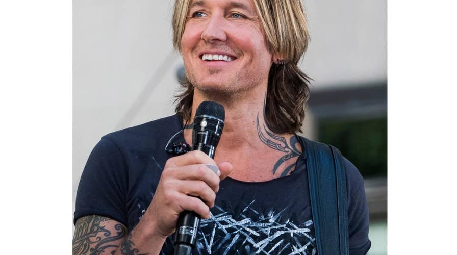 New Jersey woman buys coffee for Keith Urban