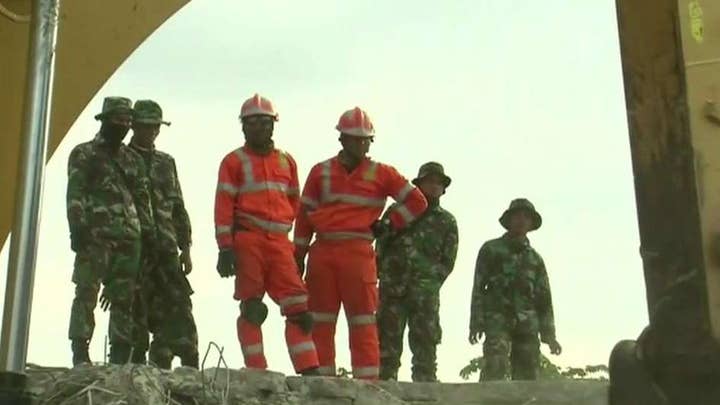 Race against time to find survivors of Indonesia earthquake