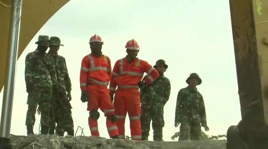 Race against time to find survivors of Indonesia earthquake