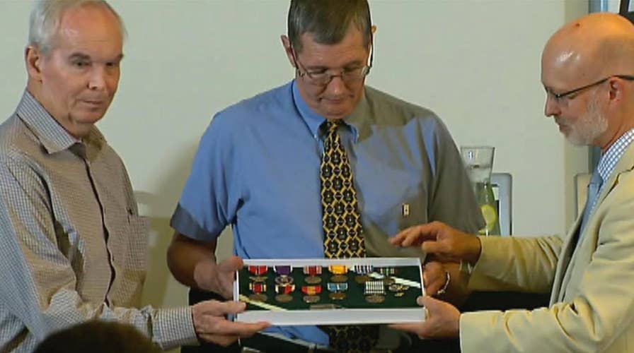 Army returns dog tag to sons of missing Korean War soldier