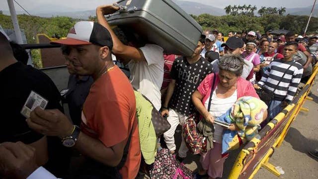 Venezuelans flee country in crisis