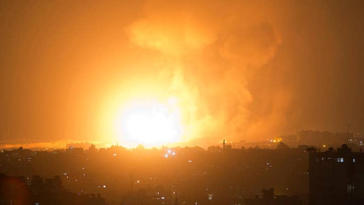 Israel launches airstrikes as militants fire 180 rockets