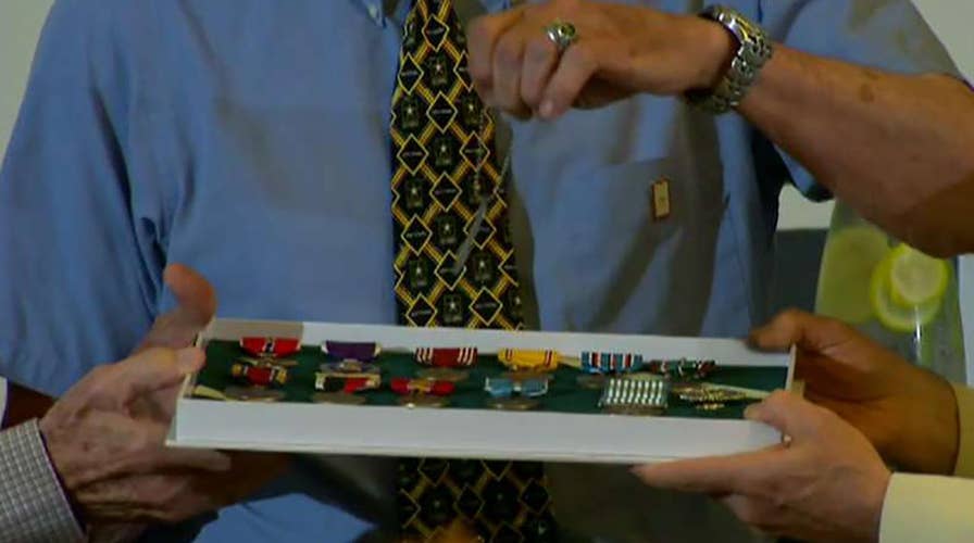 Sons are reunited with missing father's Korean War dog tag