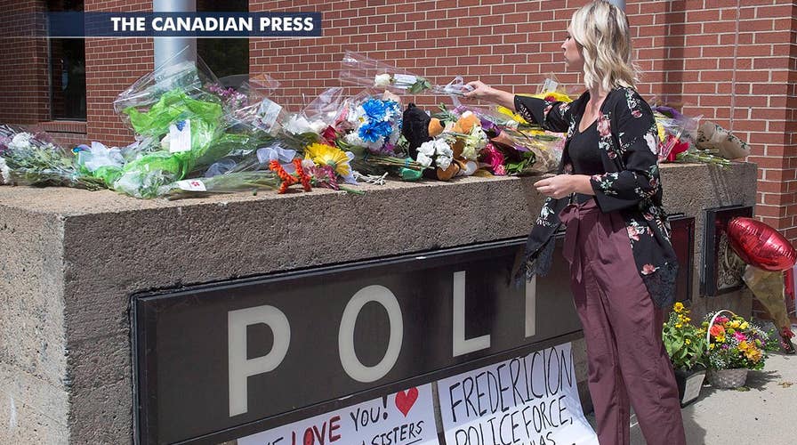 Two officers among four killed in New Brunswick rampage