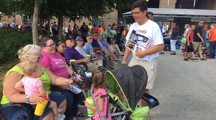 Missing Iowa student’s father takes search to state fair