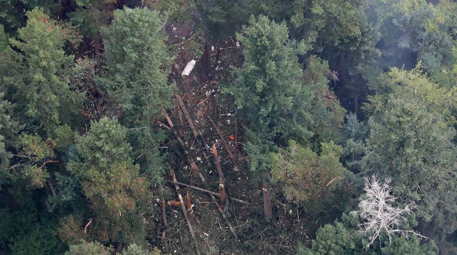 Investigators search site of Seattle plane crash