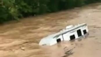 Pennsylvania boy, 12, stranded on tree is rescued from raging floodwaters