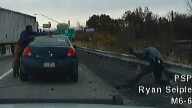 Dramatic roadside shootout with police caught on tape