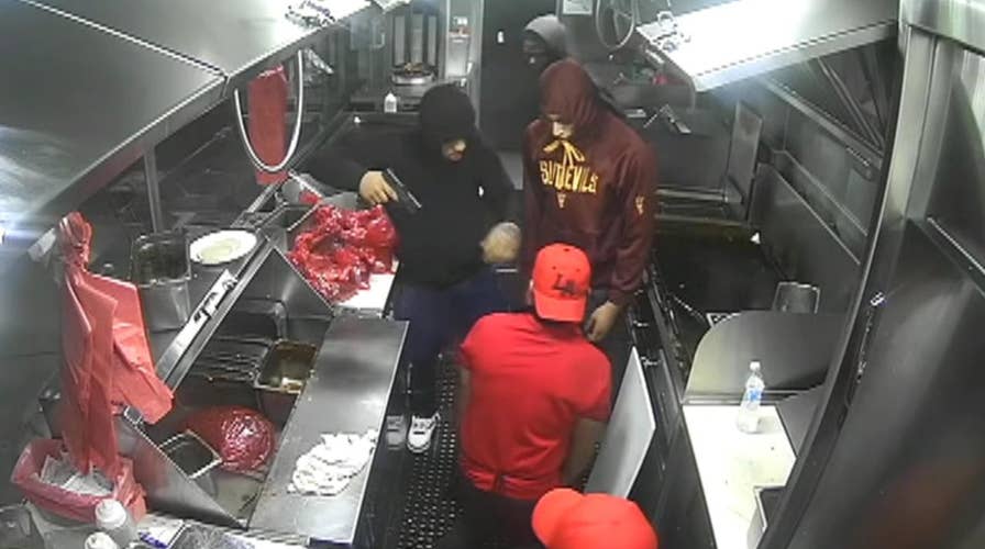 Suspects caught on video robbing California taco truck